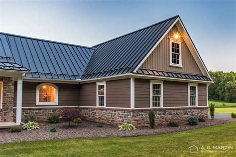 black metal roof brick house|houses with metal roofs pictures.